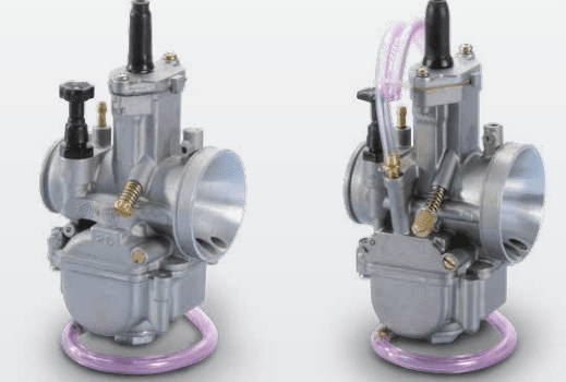 two carburetors image with pink tube on it